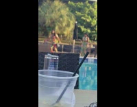 Woman Twerks for Video Next to Pool