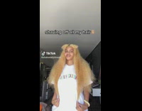 Woman cuts and shaves all her hair off 