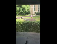 kid in pink blue tye dye hula hoop video