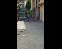 Woman red hair bra dance alley bike