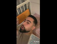 Man pretends to be baby in crib