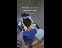 Rich boy walks through game room and theater 