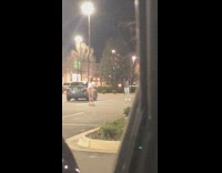 Woman white sleeves burlington parking lot pictorial