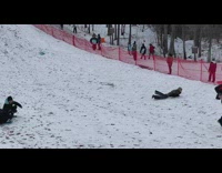 Dad pick up save kid sled hill