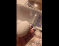 Woman finger through egg trump