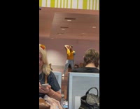 Man in yellow shirt tiktok dance at the airport