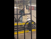 Man making music video at subway station