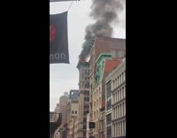 Collab winy - Crowd watches fire from the rooftop building