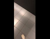 Poop on bathroom floor next to toilet