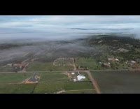 Drone shot over trees cloudy sky hyperlapse