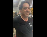 Man pulls out gigantic bagel from oven