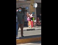 Dora the explorer and mickey mouse slow dancing on sidewalk