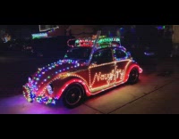 Car decorated with christmas lights naughty nice 