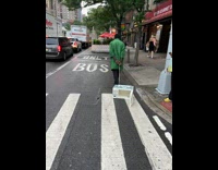 Man green shirt drag microwave on street
