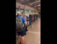 MTA worker announcing train arrivals 