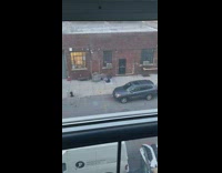 Guy Rolls Around on Sidewalk 