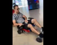 Guy ride electric cart with speakers behind