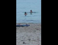 Couple bikini photo shoot beach waves Part 2