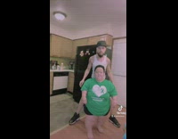 Couple tries to do stretch challenge 