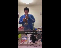 Guy chugs dirty bong water blue shirt