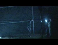 Man black jacket dance with flashing lights