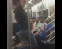 two guys hanging from subway rail in train