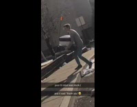 Collab BitchMP - Guy lifts robot car onto sidewalk