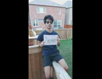 Blue shirt guy holds paper time perception 