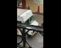 White truck driver leans on horn 