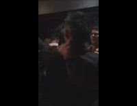 music guys in black carrying guy and spinning him