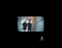 Two guys have conversation by ring camera 