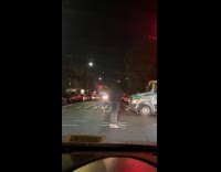 Collab WINY - Man black hoodie dance middle of street