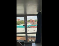 Guy loses pink balloon out window