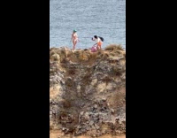 Collab IITW - Woman white bikini green hat beach rock