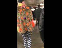 following a person with cheetah print jacket