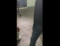 Close up video of saxophone performer and dancing stuffed animals guy