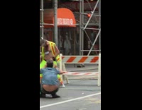 Guy neon green pants vest air guitar