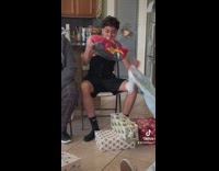 Guy opens lightning mcqueen toy for christmas