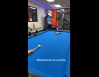 Person throws billiard stick instead of hitting ball