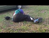 Guy back flips off back of a car and fails