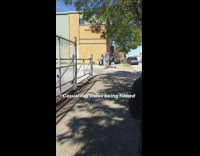 Man blue outfit fences music video