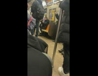 Woman tries to get other people to sing 