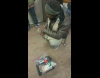 Collab Subway Creatures - man talking to himself with plastic bag 