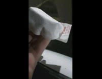 Guy holds inflated white pocket warmer car