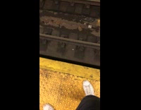 Single lost airpod dropped on train tracks in subway station