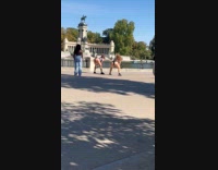 Two women twerks at El Retiro Park