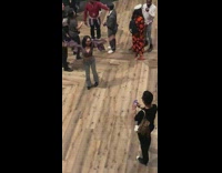 Guy commentating girl posing taking pictures halloween concert