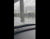 Lady drives through flooded street bronx 