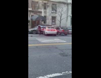 Man Hangs on Car as it Hits other Car