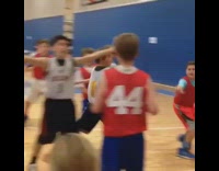 Kid passes basketball hits opposing player fail
